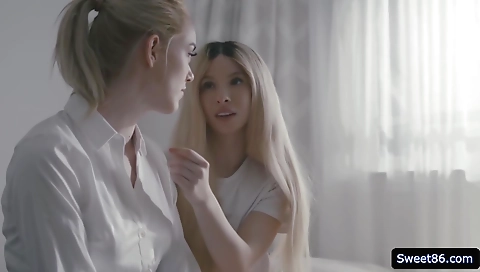 Sexy young blonde towers in a stripper husbandon